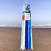 Add a touch of the sea life with the Coastal Lighthouse 40-inch Windsock.