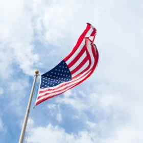 American flag flying at full staff for Veterans Day in Colorado